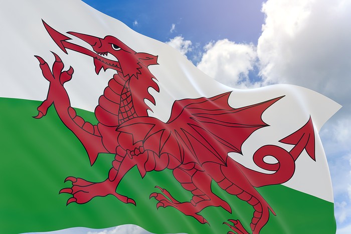 Wales Flag Against Blue Sky